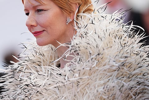 Sandra Hüller poses for photographers upon arrival at the premiere of the film 'Fatherland' at the 79th international film festival, Cannes, southern France.