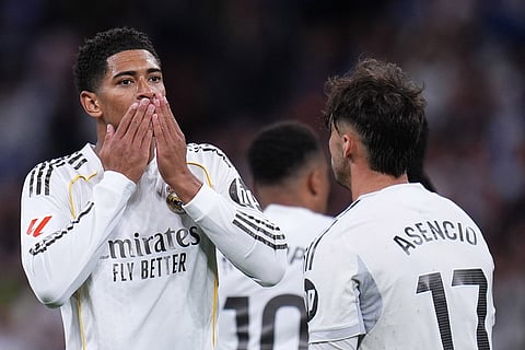 Real Madrid's Jude Bellingham celebrates after scoring his side's second goal during the Spanish La Liga soccer match between Real Madrid and Real Oviedo in Madrid, Spain.