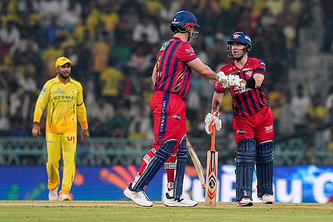 Lucknow Super Giants' Mitchell Marsh, front left, and Josh Inglis greet each other between the wickets during an Indian Premier League (IPL) 2026 T20 cricket match between Lucknow Super Giants and Chennai Super Kings, in Lucknow, Uttar Pradesh.