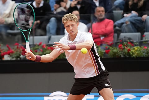 Spain's Martin Landaluce, returns the ball to Daniil Medvedev, during their match at the Italian Open tennis tournament in Rome.