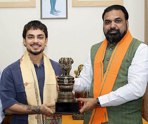 Bihar Chief Minister Samrat Choudhary, right, felicitates cricketer Ishan Kishan for his contributions in the ICC T20 World Cup 2026, in Patna, Bihar. 