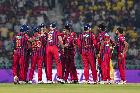 Lucknow Super Giants' players celebrate after the dismissal of Chennai Super Kings' captain Ruturaj Gaikwad during an Indian Premier League (IPL) 2026 T20 cricket match between Lucknow Super Giants and Chennai Super Kings, in Lucknow, Uttar Pradesh.