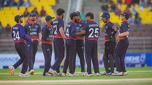 CricketNep/X : Nepal cricketers in action against UAE.