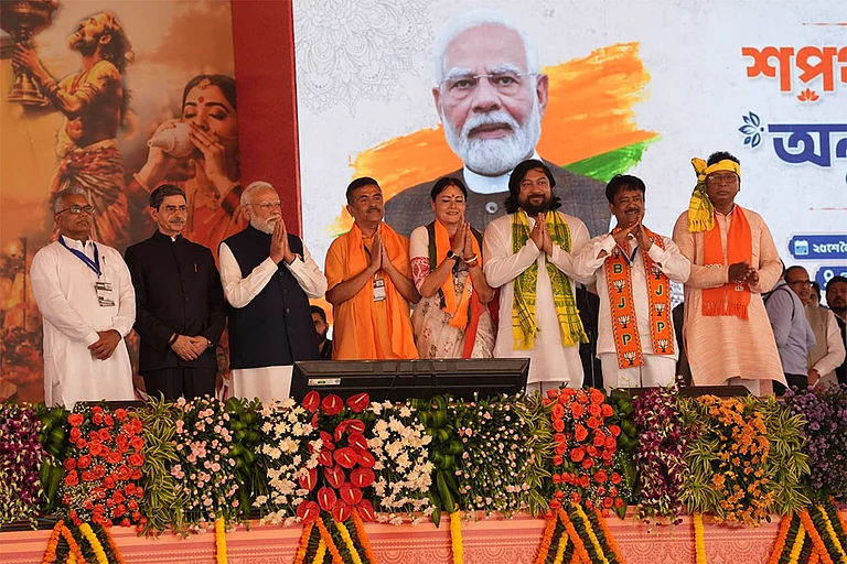 Prime Minister Narendra Modi along with West Bengal Governor RN Ravi, newly appointed Chief Minister Suvendu Adhikari and his Cabinet of ministers after oath taking ceremony in Kolkata, West Bengal, India. - | Photo: Sandipan Chatterjee