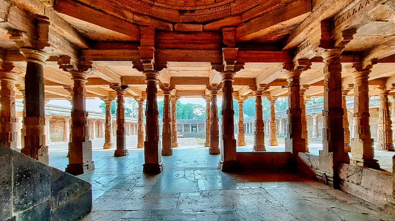 Pillars and spacious hall inside the Kamal Maula Mosque complex