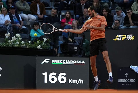 Daniil Medvedev returns the ball to Spain's Martin Landaluce, during their match at the Italian Open tennis tournament in Rome.