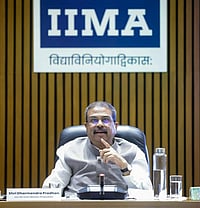 NEET-UG 2026 To Be Held In CBT Mode From Next Year, Re-Exam On June 21 PTI : In this image posted on May 14, 2026, Union Education Minister Dharmendra Pradhan attends the meeting of the Coordination Forum of Indian Institutes of Management, at IIM Ahmedabad.