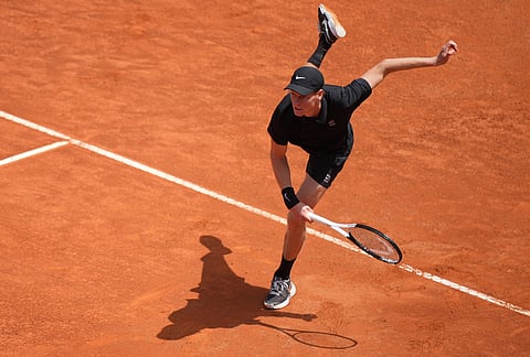 Italy's Jannik Sinner serves a ball to Andrey Rublev, during their match at the Italian Open tennis tournament in Rome.