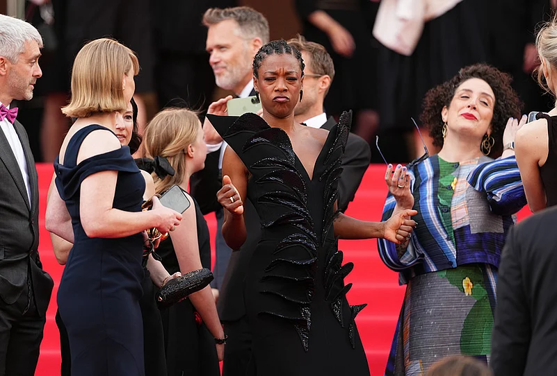 Samira Wiley, centre, poses for photographers upon arrival at the premiere of the film Fatherland at the 79th international film festival, Cannes, southern France.