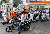 | Photo: PTI : Commuters at a petrol pump after petrol and diesel prices were hiked by Rs 3 per litre each, the first increase in over four years, amid rising global crude oil prices, in Jammu, Jammu and Kashmir.
