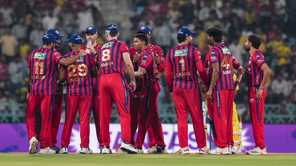 Lucknow Super Giants' players wearing black armbands during their Indian Premier League match against Chennai Super Kings in Lucknow, Uttar Pradesh. - PTI