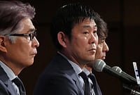 Japan At FIFA World Cup 2026: Injured Mitoma Left Out Of Blue Samurai Squad | Photo: AP/Eugene Hoshiko : Masakuni Yamamoto, left, national team director, Hajime Moriyasu, center, head coach of Japan's national soccer team, and Tsuneyasu Miyamoto, president of the Japan Football Association, attend a news conference announcing Japan's squad for the 2026 FIFA World Cup in Tokyo.