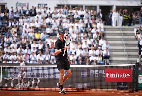 Italy's Jannik Sinner reacts after beating Andrey Rublev 6-2, 6-4, during their match at the Italian Open tennis tournament in Rome.