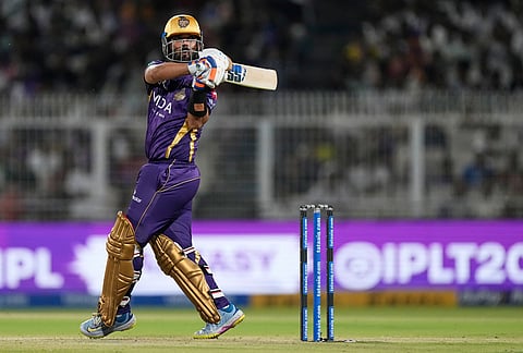 Kolkata Knight Riders' captain Ajinkya Rahane plays a shot during the Indian Premier League cricket match between Gujarat Titans and Kolkata Knight Riders, in Kolkata.