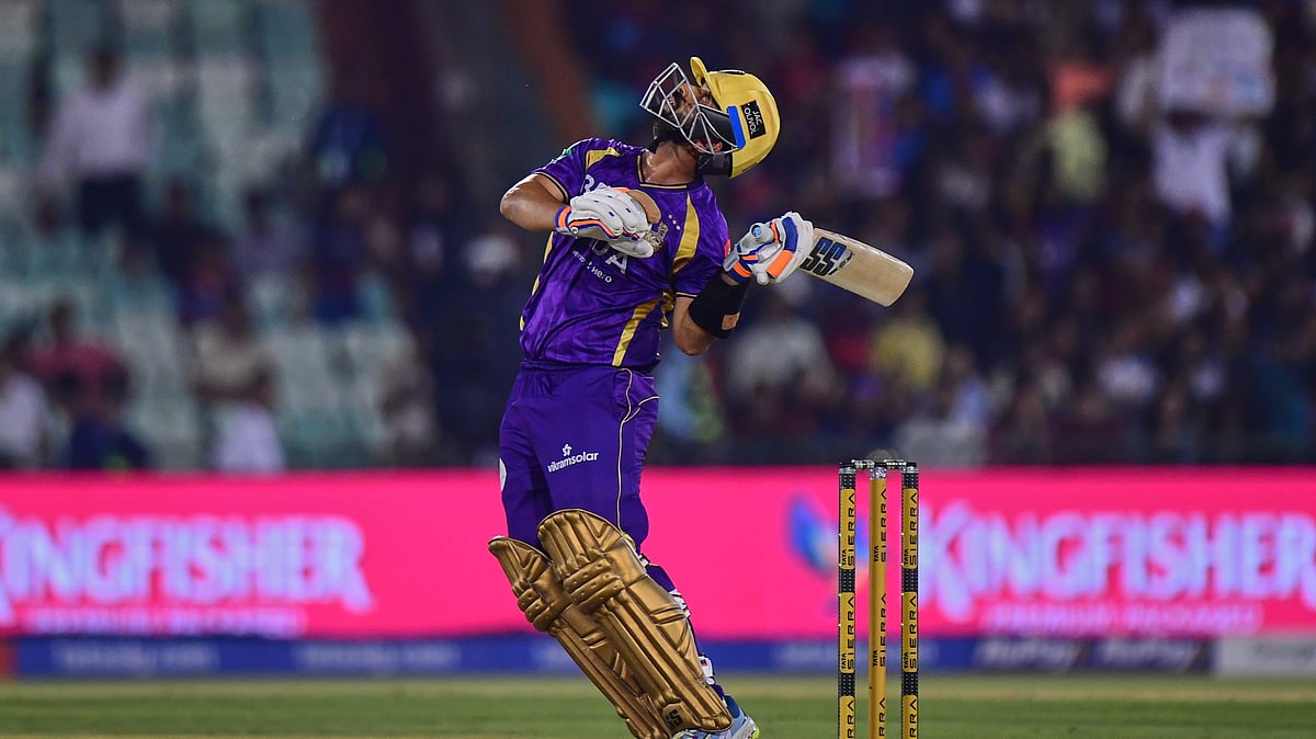 Kolkata Knight Riders' captain Ajinkya Rahane watches the ball after playing a shot during the Indian Premier League cricket match between Royal Challengers Bengaluru and Kolkata Knight Riders in Raipur, India, Wednesday, May 13, 2026. - (AP Photo/Abhijit Addya)