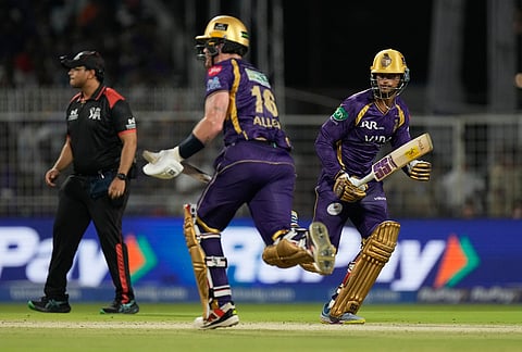 Kolkata Knight Riders' Angkrish Raghuvanshi, right, and Finn Allen run between the wickets during the Indian Premier League cricket match between Gujarat Titans and Kolkata Knight Riders, in Kolkata.