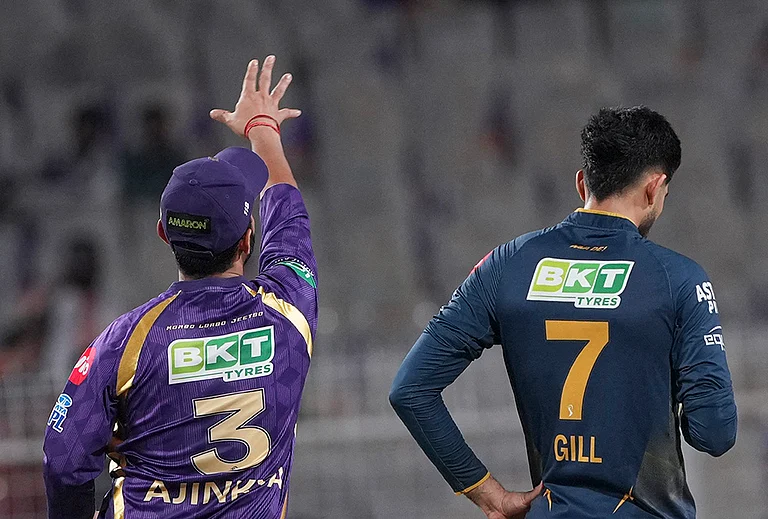 Kolkata Knight Riders' captain Ajinkya Rahane, left, flips the coin as Gujarat Titans' captain Shubman Gill takes the call during the toss before an Indian Premier League (IPL) 2026 T20 cricket match between Kolkata Knight Riders and Gujarat Titans, in Kolkata, West Bengal. - | Photo: PTI/Manvender Vashist Lav