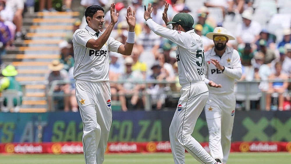 SA vs PAK 2nd test Day 1: Pakistan's Mohammad Abbas and Babar Azam celebrate the wicket of South Africa's Wiaan Mulder - | Photo: AP/Halden Krog