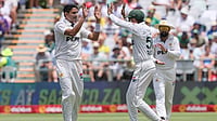| Photo: AP/Halden Krog : SA vs PAK 2nd test Day 1: Pakistan's Mohammad Abbas and Babar Azam celebrate the wicket of South Africa's Wiaan Mulder