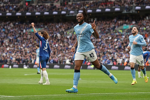 Manchester City's Antoine Semenyo celebrates after scoring the opening goal during the English FA Cup final soccer match between Chelsea and Manchester City in London.