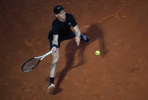 Italy's Jannik Sinner returns a ball to Daniil Medvedev of Russia during their semifinal match at the Italian Open tennis tournament in Rome.