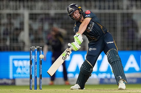 Gujarat Titans' Jos Buttler hits a six during the Indian Premier League cricket match between Gujarat Titans and Kolkata Knight Riders, in Kolkata.
