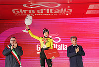 | Photo: Gian Mattia d'Alberto/LaPresse via AP : Denmark's Jonas Vingegaard celebrates on the podium after winning the 7th stage of the Giro d'Italia cycling race, from Formia to Blockhaus, Italy.