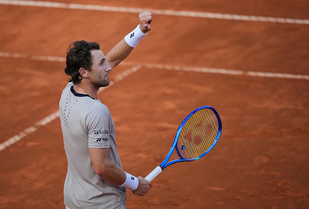 Casper Ruud of Norway celebrates after winning against Luciano Darderi during their semifinal match at the Italian Open tennis tournament in Rome. - | Photo: AP/Andrew Medichini