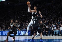 Minnesota Vs San Antonio, NBA 2026 Playoffs: Stephon Castle-Powered Spurs Eliminate Timberwolves | Photo: AP/Abbie Parr : San Antonio Spurs forward Victor Wembanyama, center, passes over Minnesota Timberwolves guard Terrence Shannon Jr. (1) during the second half of Game 6 of an NBA basketball second-round playoffs series in Minneapolis.