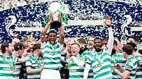 Celtic 3-1 Hearts, Scottish Premiership: Late Drama Crowns Hosts Champions For Fifth Year Running | Photo: AP/Andrew Milligan : Celtic's Auston Trusty with the Scottish Premier League Trophy following his side's title deciding match against Heart of Midlothian at Celtic Park, in Glasgow, Scotland, Saturday May 16, 2026.