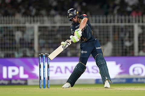 Gujarat Titans' Jos Buttler plays a shot during the Indian Premier League cricket match between Gujarat Titans and Kolkata Knight Riders, in Kolkata.