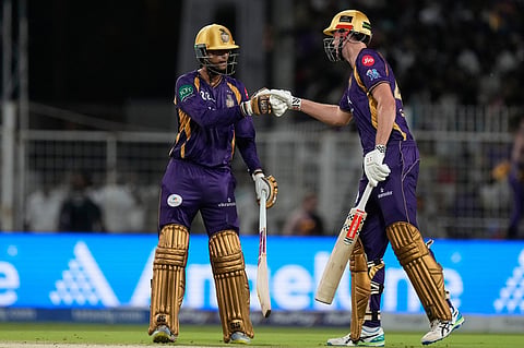 Kolkata Knight Riders' Angkrish Raghuvanshi, left, and Cameron Green encourage each other as they bat during the Indian Premier League cricket match between Gujarat Titans and Kolkata Knight Riders, in Kolkata.