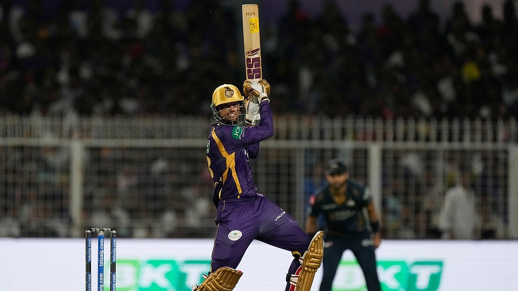 Angkrish Raghuvanshi hits a six during the Indian Premier League match between Gujarat Titans and Kolkata Knight Riders, in Kolkata. - AP/Bikas Das
