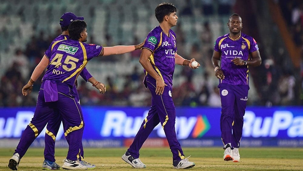 Kolkata Knight Riders' Kartik Tyagi celebrates with teammates the wicket of Royal Challengers Bengaluru's Jacob Bethell during the Indian Premier League cricket match between Royal Challengers Bengaluru and Kolkata Knight Riders in Raipur, India. - | Photo: AP/Abhijit Addya