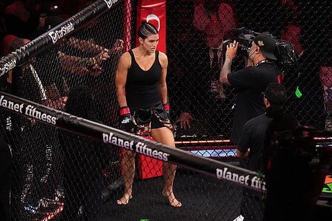 Gina Carano, of the United States, is introduced before facing Ronda Rousey, of the United States, in their featherweight mixed martial arts fight in Inglewood, Calif.