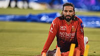 PBKS Vs RCB, IPL 2026: Is Rajat Patidar Playing Today In Dharamsala? | Photo: AP/Abhijit Addya : Royal Challengers Bengaluru's captain Rajat Patidar sits out against Punjab Kings in Dharamsala on Sunday, May 17.