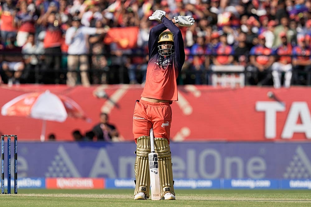 Royal Challengers Bengalurus Venkatesh Iyer celebrates his fifty runs