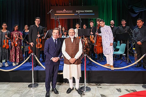 In this image posted on May 17, 2026, Prime Minister Narendra Modi being welcomed with a performance by artistes after his arrival, in Gothenburg, Sweden. Swedish PM Ulf Kristersson is also seen.