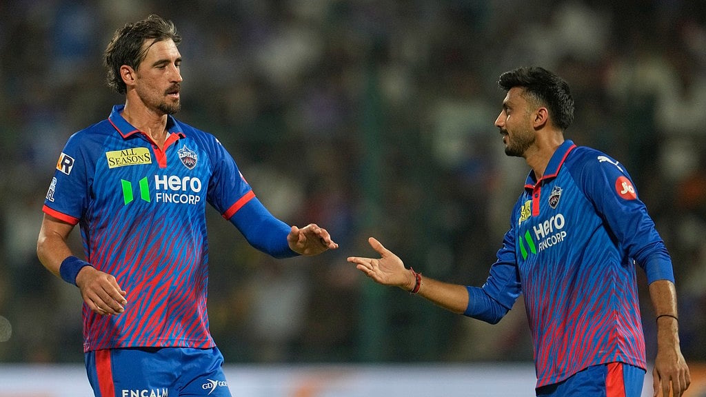 Mitchell Starc takes a four-wicket haul to bring Delhi Capitals back in the game from a precarious position against Rajasthan Royals on Sunday, May 17. - AP Photo/Manish Swarup