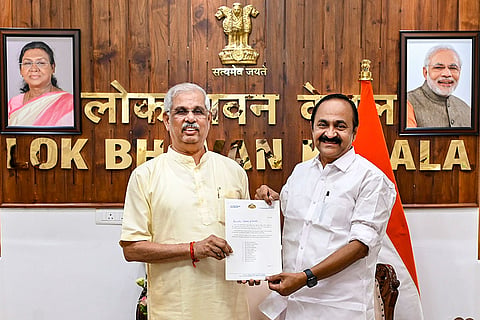 In this image posted on May 17, 2026, Kerala Governor Rajendra Vishwanath Arlekar receives the list of cabinet ministers from the Chief Minister-designate V D Satheesan ahead of the swearing-in ceremony, at the Lok Bhavan, in Thiruvananthapuram.