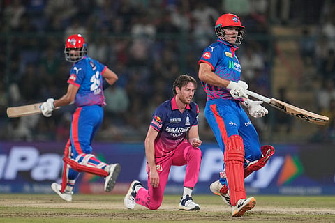 Delhi Capitals' Tristan Stubbs, right, and his batting partner Axar Patel run between the wickets during the Indian Premier League cricket match between Delhi Capitals and Rajasthan Royals in New Delhi, India.