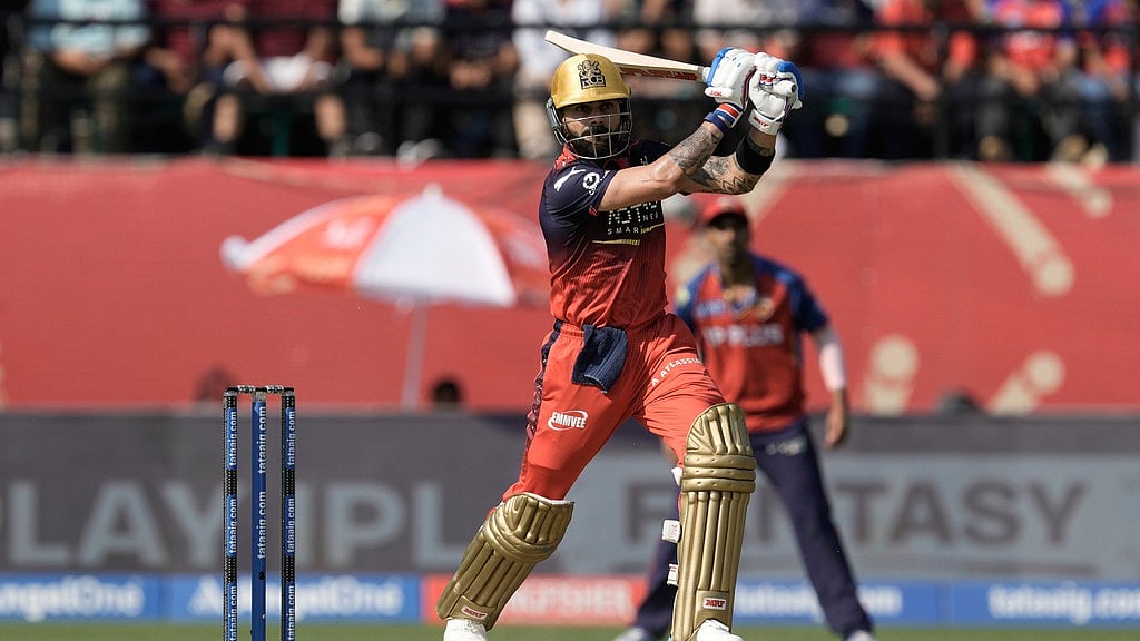 AP Photo/Ashwini Bhatia : Royal Challengers Bengaluru's Virat Kohli plays a shot during the Indian Premier League cricket match between Punjab Kings and Royal Challengers Bengaluru in Dharamshala, India, Sunday, May 17, 2026. 