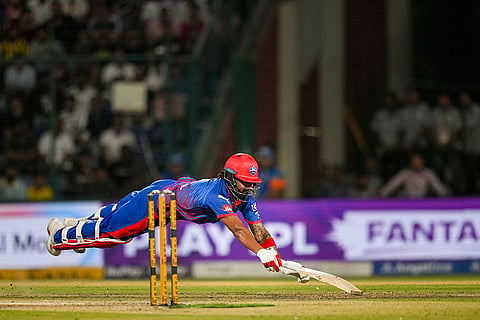 Delhi Capitals' KL Rahul dives to reach the crease during an Indian Premier League (IPL) 2026 T20 cricket match between Delhi Capitals and Rajasthan Royals, in New Delhi.