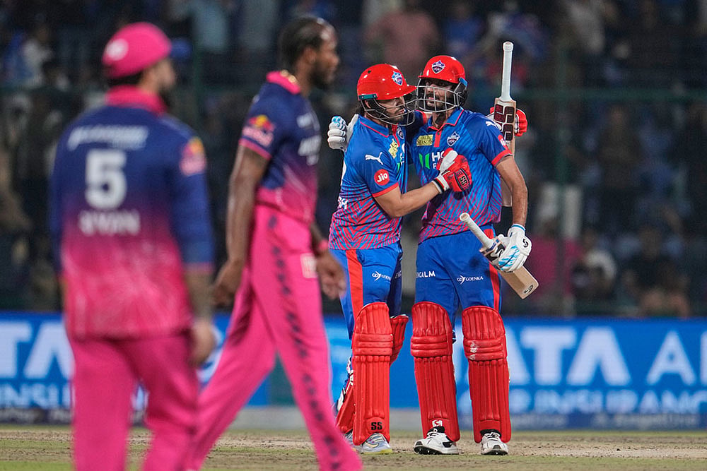| Photo: AP/Manish Swarup : Delhi Capitals captain Axar Patel, right, and Ashutosh Sharma celebrates after winning the Indian Premier League cricket match against Rajasthan Royals in New Delhi, India.