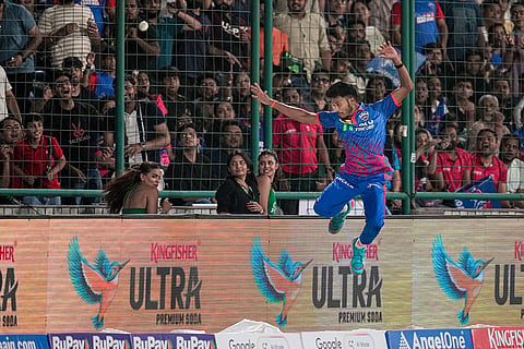 Delhi Capitals' Tripurana Vijay attempts to field the ball during an Indian Premier League (IPL) 2026 T20 cricket match between Delhi Capitals and Rajasthan Royals, in New Delhi.