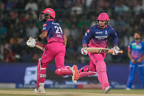 Rajasthan Royals' Dhruv Jurel, left, and Vaibhav Sooryavanshi run between the wickets during the Indian Premier League cricket match between Delhi Capitals and Rajasthan Royals in New Delhi, India.