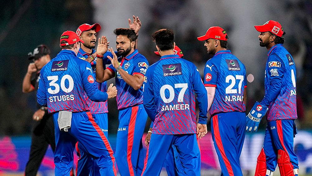 Delhi Capitals' Mukesh Kumar celebrates with teammates after dismissing Gujarat Titans' Sai Sudharsan during an Indian Premier League (IPL) 2026 T20 cricket match between Delhi Capitals and Gujarat Titans, at Arun Jaitley Stadium, in New Delhi. - | Photo: Salman Ali
