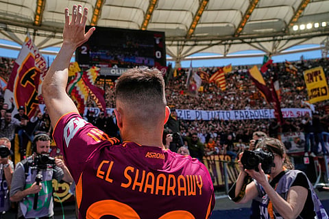 Roma's Stephan El Shaarawy greets soccer fans at the end of the Italian Serie A soccer match between Roma and Lazio in Rome.