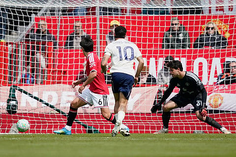 Nottingham Forest's Morgan Gibbs-White, centre, scores his side's second goal during the English Premier League soccer match between Manchester United and Nottingham Forest in Manchester, England.