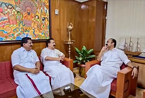 Newly sworn-in Kerala Chief Minister VD Satheesan with state Minister Ramesh Chennithala and others after the swearing-in ceremony of the state government, in Thiruvananthapuram.
